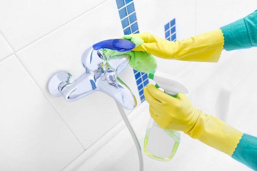 Professional mattress cleaning equipment in use